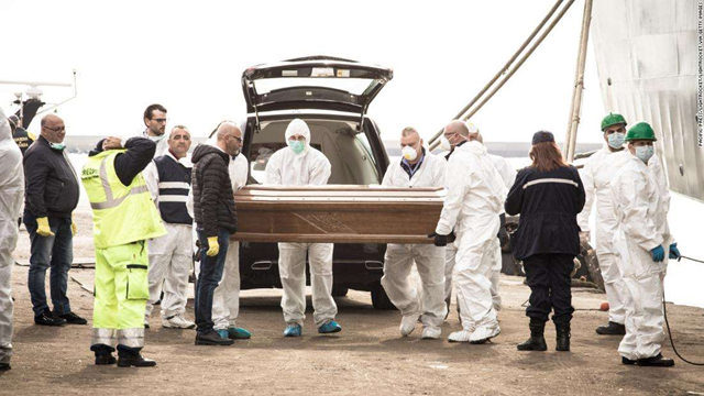 The bodies of 26 young migrants arrive at the Italian port town of Salerno on 5 November 2017. Photo: Pacific Press / LightRocket / Getty Images