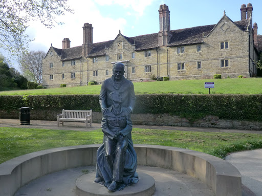 CIMG9830 Sir Archibald McIndoe monument in front of Sackville College, East Grinstead