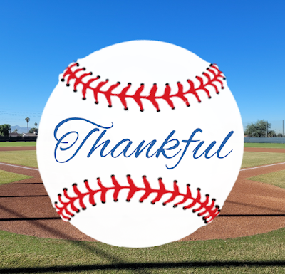 baseball on a field with thankful writen on it