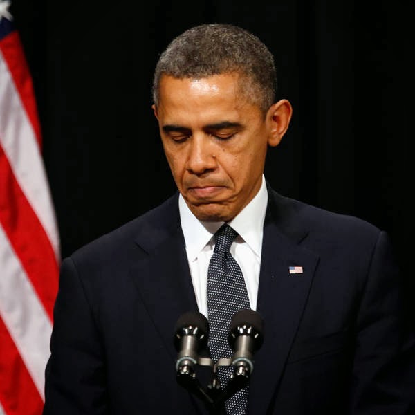 U.S. President Barack Obama speaks at a vigil held at Newtown High School for families of victims of the Sandy Hook Elementary School shooting in Newtown, Connecticut.