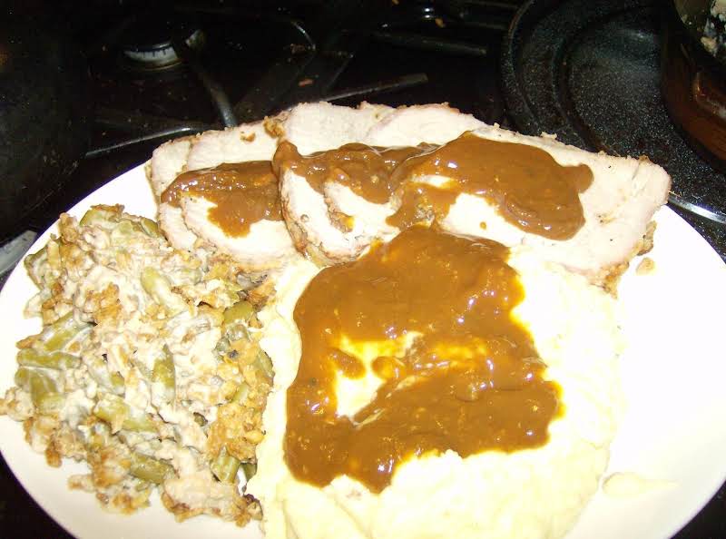 Oven Roasted Rolled Pork With Green Bean Casserole With Parmesan And Mashed Potatoes Served With A Gravy Made From The Drippings. What's Not To Love About This Tasty Meal.