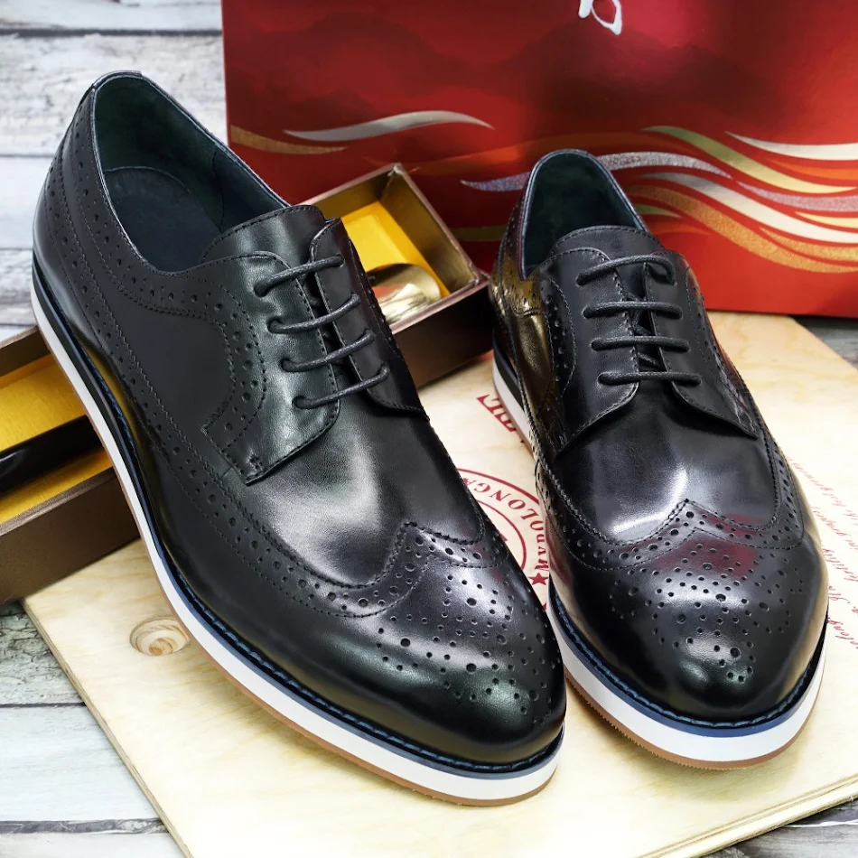 Zapatos de cuero planos de negocios casuales europeos y americanos para hombre, cómodos y elegantes, ideales para uso diario y profesional.