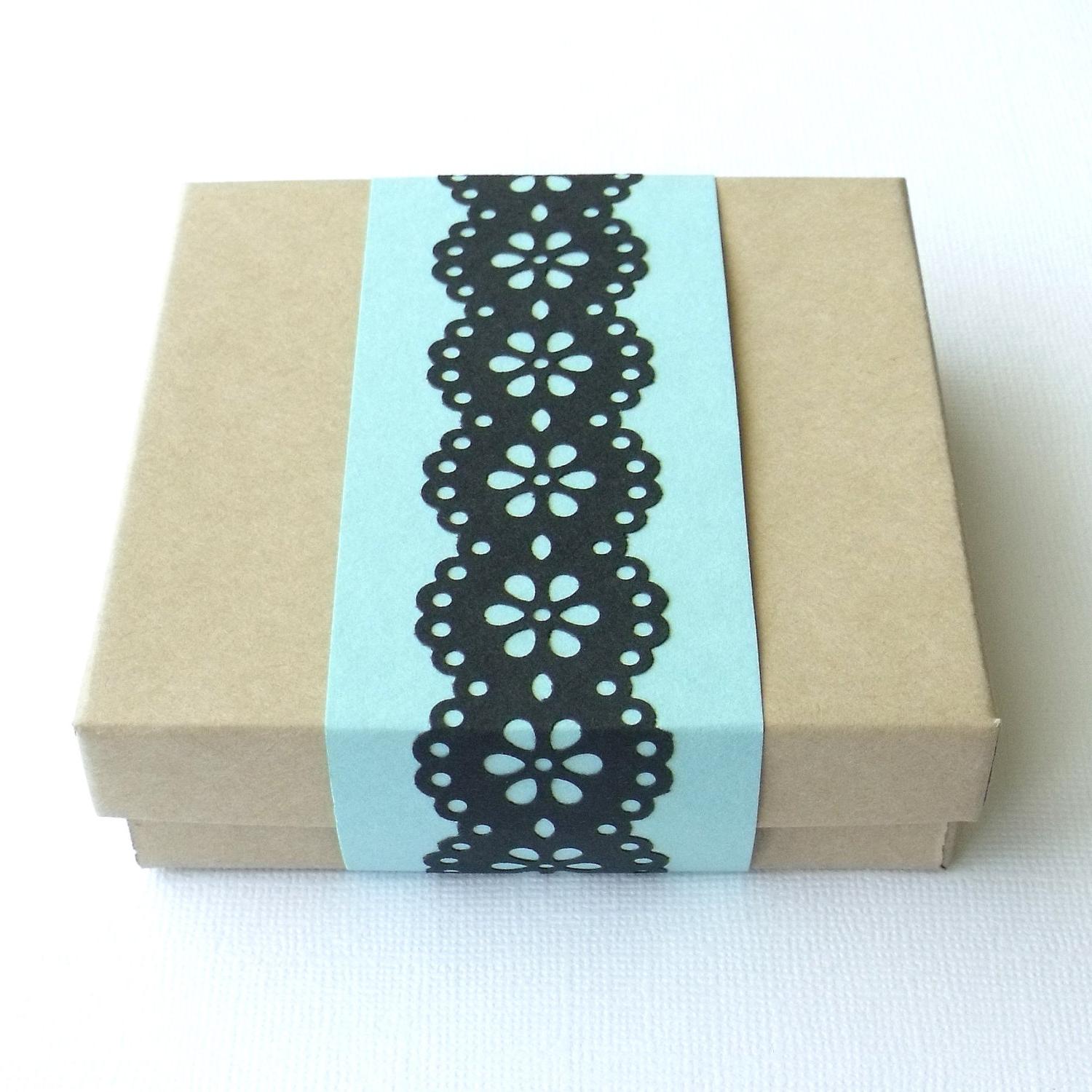 COLORS: Black floral cut out design over light blue  like a perfect blue