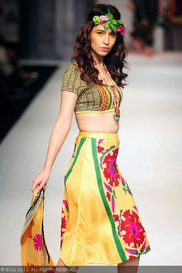 A model showcases a creation by fashion designer Anupama Dayal on Day 1 of Wills Lifestyle India Fashion Week (WIFW) Spring/Summer 2014, held in Delhi.