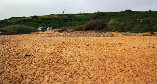 Omaha Beach and the sight facing the Marines when coming ashore