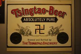 Tsingtao label with swastika and the words absolutely pure