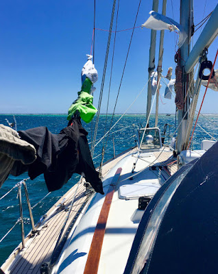 Hanging clothes out to dry on yacht