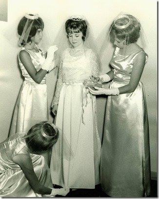 Attendants Assist Bride
