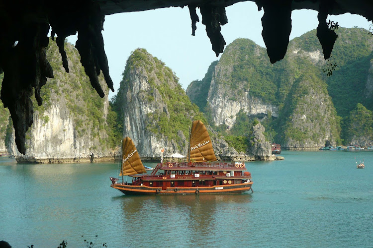 Hạ Long Bay, in northeast Vietnam, is known for its emerald waters and countless towering limestone islands topped by rainforests.