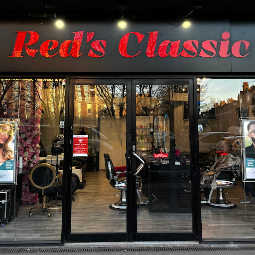 Red's Classic Salon & Barbershop logo