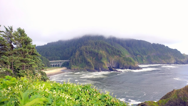 At Heceta Head Lighthous Viewpoint, the view of Cape Creek Cove and Cape Creek Bridge