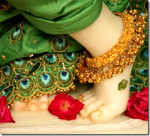 [Krishna's lotus feet]