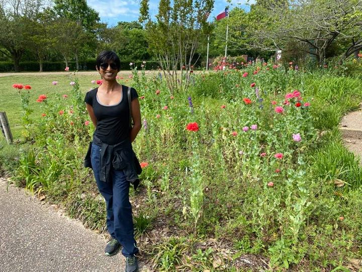 Image may contain: Sue Royappa, standing, plant, tree, flower, outdoor and nature