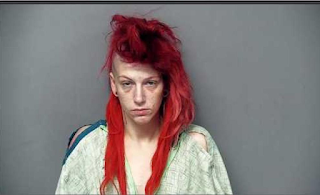 Woman charged for running naked on football field while high on heroin in front of eighth graders