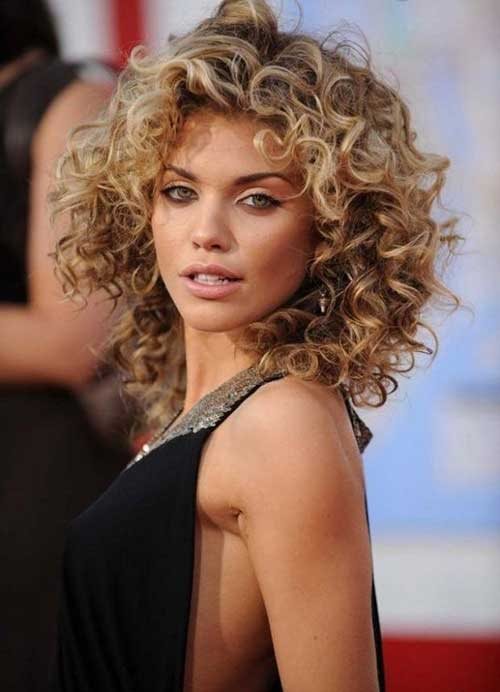 layered messy hairstyle for curly hair - Styles 7