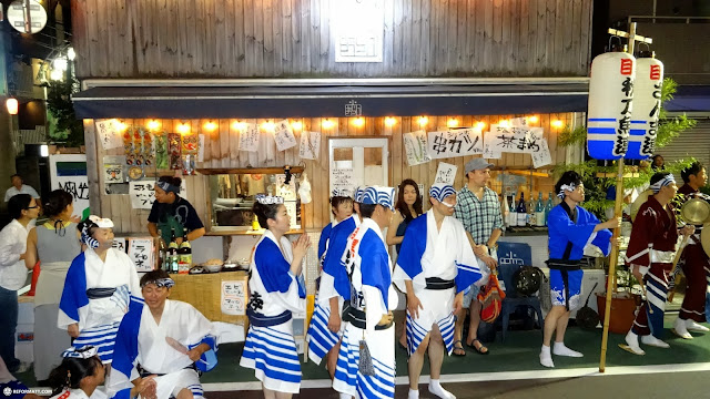 night time at the awa odori matsuri in nakameguro in Meguro, Japan 