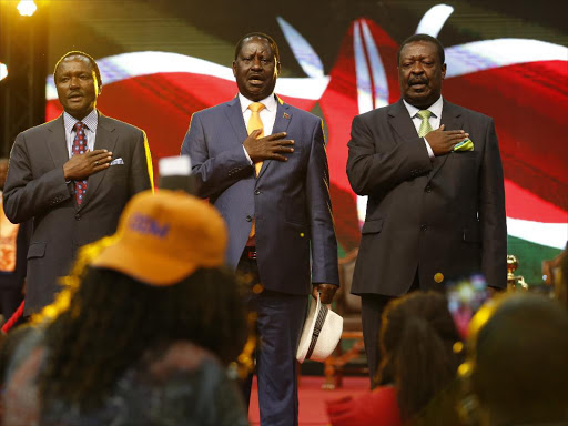 NASA flag bearer Raila Odinga with his co-principals Musalia Mudavadi and Kalonzo Musyoka during the ODM National Delegates’ Conference at Kasarani stadium in Nairobi, May 5, 2017. /JACK OWUOR