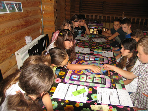 L.g: El juego de mesa “El flujo del dinero 101”. Conceptos fundamentales. Para niñas y niños.
