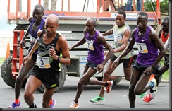 Meb leads the pack.   The Purple shirts are close behind!