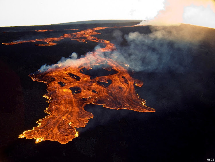 FILE PHOTO: The Mauna Loa volcano on the island of Hawaii is shown in this March 25, 1984 handout photo provided by the .. Geological Survey, and released to Reuters on June 19, 2014.