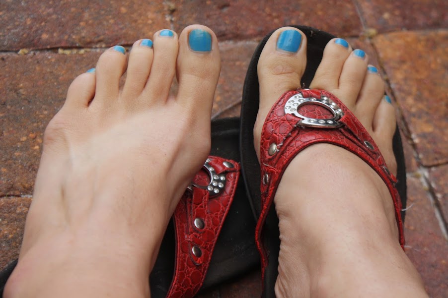 My feet painted with tan lines from my favorite flip-flops.