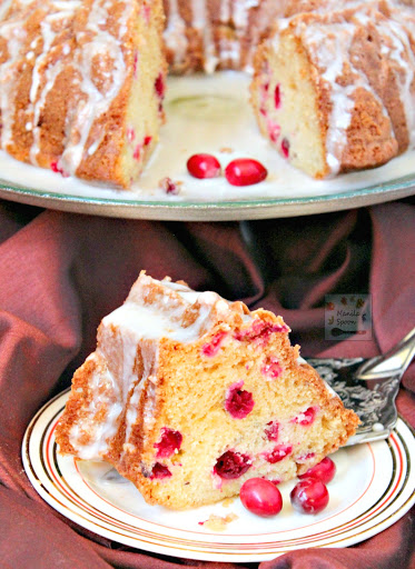 Use fresh, frozen or dried cranberries to make this moist and delicious White Chocolate Cranberry Coffee Cake. Perfect to serve for tea time as well. | manilaspoon.com