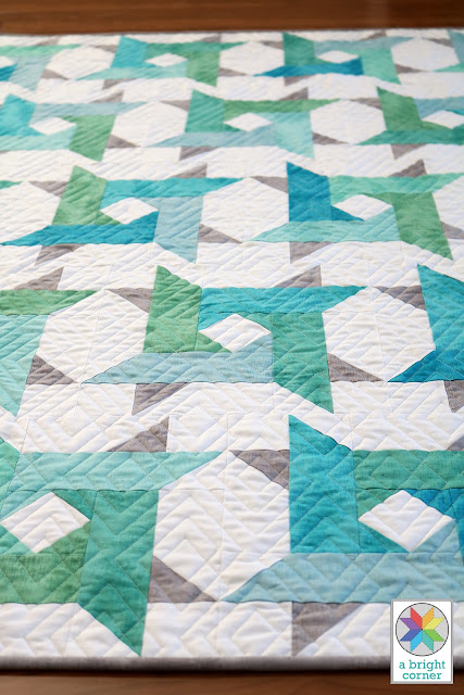 Windy City pattern by Andy of A Bright Corner is a modern twist on a star quilt.  Pre-cut friendly and perfect for using jelly roll strips, layer cake squares, fat quarters, or yardage. Has four size: crib, throw, twin, queen