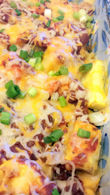 Recipe for a Vegetarian Southwest Squash Casserole that uses yellow squash, butternut squash, and green chiles and red salsa