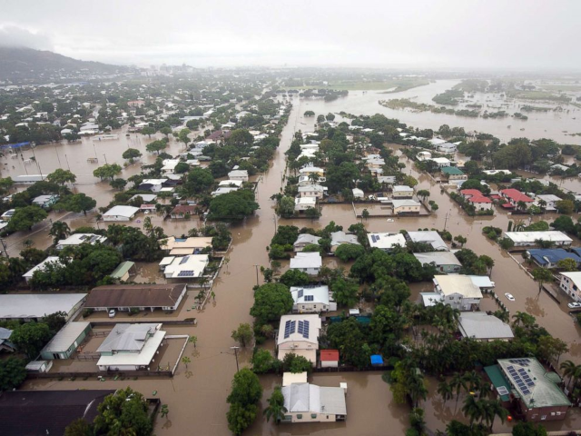 An aerial view shows houses inundated with flood waters in Townsville, Queensland, Australia, 4 February 2019. Photo: Dave Acree / EPA / Shutterstock