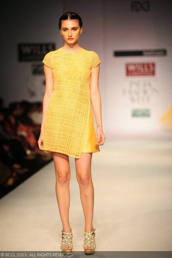 Marii walks the ramp for fashion designer Manish Gupta on Day 2 of the Wills Lifestyle India Fashion Week (WIFW) Spring/Summer 2014, held in Delhi.