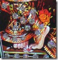 [Krishna's lotus feet]