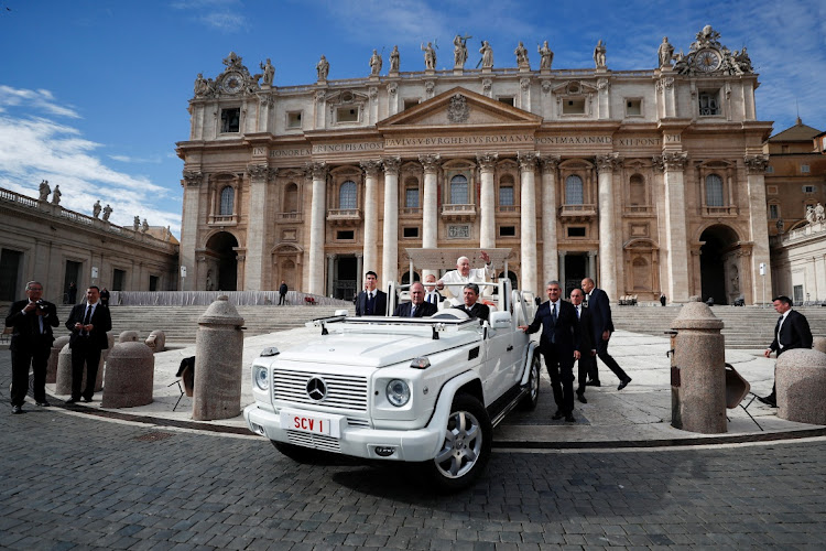 Pope Francis waves following the weekly general audience in St Peter's Square at the Vatican, November 9 2022. Picture: GUGLIELMO MANGIAPANE/REUTERS