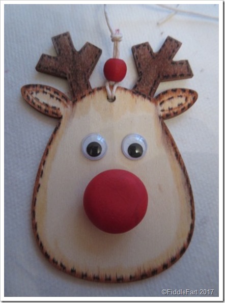 wooden Rudolph tag with fimo nose.