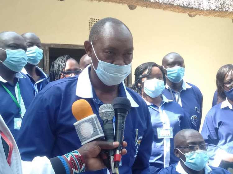 The Kenya Union of Special Needs Education Teachers secretary general James Torome addresses media after union elections in Narok town