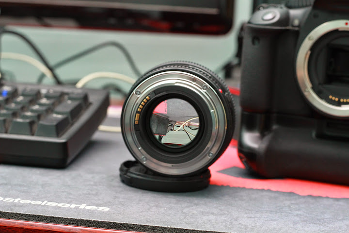 Bán 1 em canon 550D + lens canon 50 F1.4 +Grip Canon BG-E8 + 1 Túi Lowepro + G11 - 5