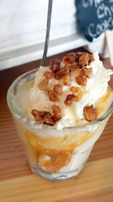 Ruby Jewel sundae combo of Chocolate Chip Squared Ice Cream with Caramel Sauce and Pralined Pecans with Whipped Cream