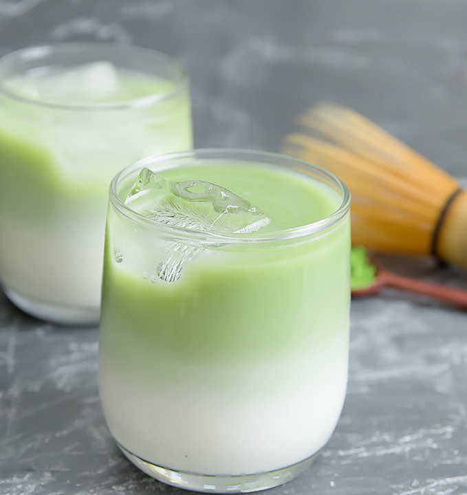 photo of a matcha green tea latte in a short glass