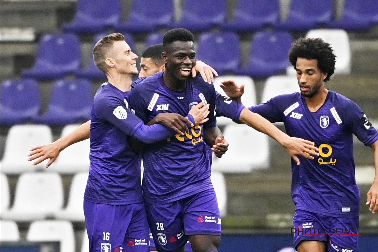 Club's Percy Tau and Anderlecht's Derrick Luckassen fight for the