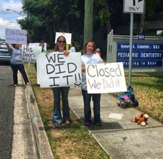 150514 parents close down schneider office