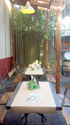 EastBurn back patio with its swings for seats at the tables!