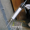 The spring drive dual cartridge gun injects crack repair materials through a static mixer attached at the end.