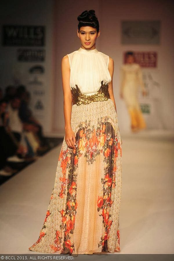 A model walks the ramp for fashion designer Sulakshana on Day 5 of Wills Lifestyle India Fashion Week (WIFW) Spring/Summer 2014, held in Delhi.