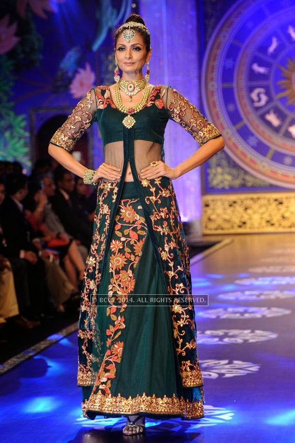 A model walks the ramp for the finale of India International Jewellery Week (IIJW), 2014, held at Grand Hyatt, in Mumbai.