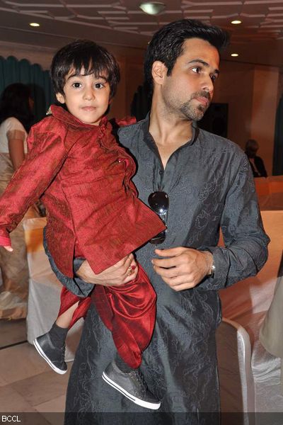 Papa Emraan Hashmi seen having tough time handling his cute son Ayaan at Udita Goswami and Mohit Suri's wedding ceremony, held at ISKCON Juhu in Mumbai on January 29, 2013. (Pic: Viral Bhayani)