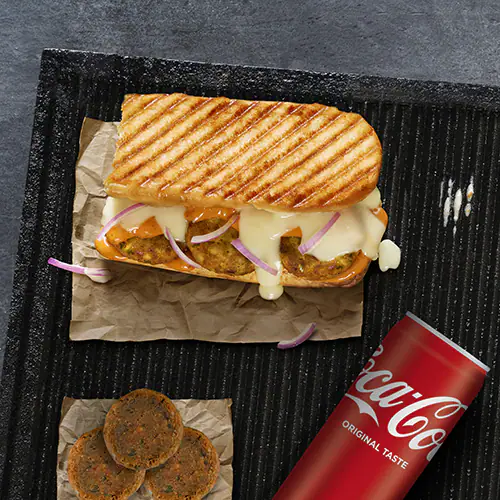 Delhi Tikki Sandwich + Side + Coke