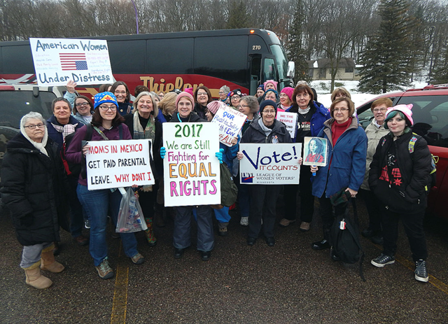 About 60 women and a few men return to New Ulm from the Women’s March Minnesota in St. Paul late Saturday afternoon. The group that rode a bus to the Twin Cities and back included people from New Ulm, Sleepy Eye, Springfield, St. Peter and Mankato. They were part of a national surge of marches inspired by the rhetoric of the last election they said insulted, demonized, and threatened them. St. Paul police estimate around 60,000 people participated in the march. Photo: Fritz Busch / The New Ulm Journal