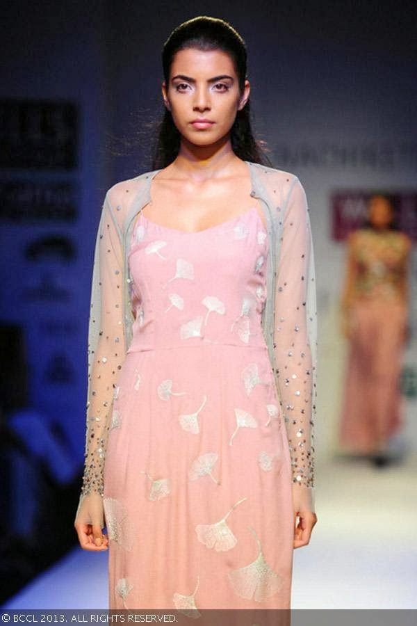 Margarita showcases a creation by fashion designer Nachiket Barve on Day 1 of Wills Lifestyle India Fashion Week (WIFW) Spring/Summer 2014, held in Delhi.