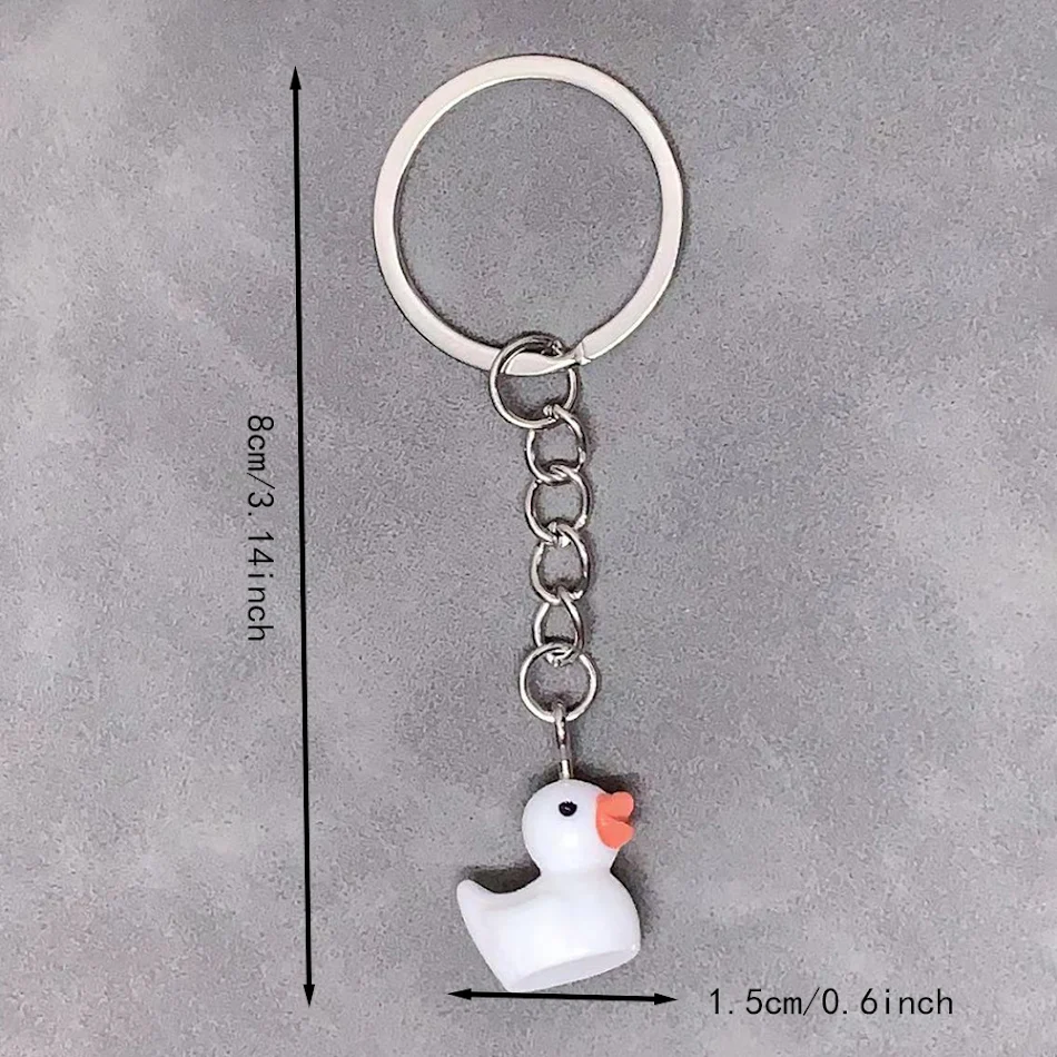 Einfacher Harz kleiner gelber Enten-Schlüsselanhänger Tieranhänger Enten-Anhänger Schlüsselkette Zubehör für Damen. Niedlich und praktisch!