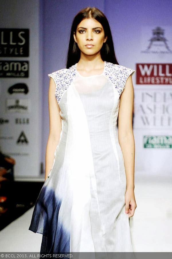 A model flaunts a creation by fashion designer Pratima Pandey on Day 3 of Wills Lifestyle India Fashion Week (WIFW) Spring/Summer 2014, held in Delhi.