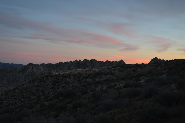 red clouds over spires